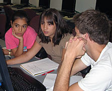 students in front of computer